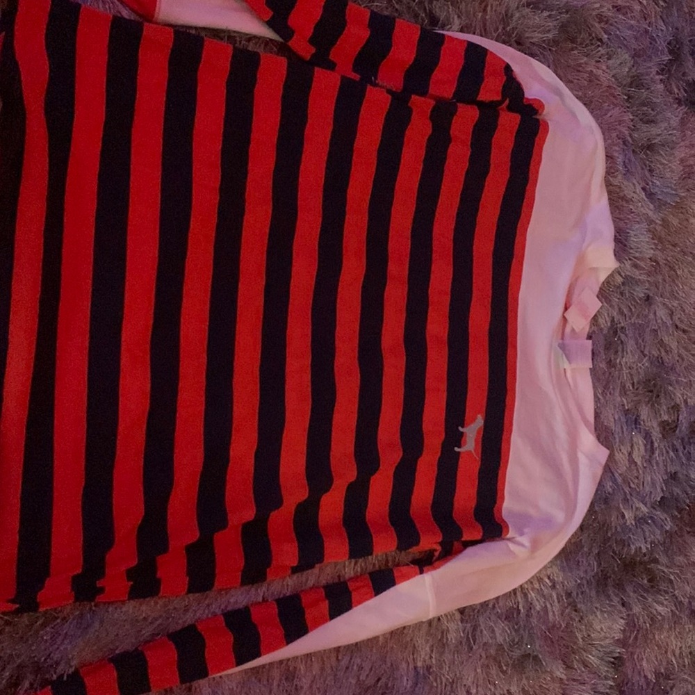 Victoria secret long sleeve has sequins and glitter on back